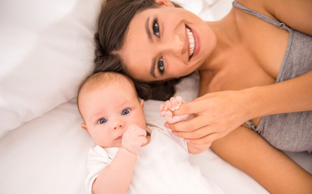 Glückliche Mutter mit Baby Glückliche Mutter mit Baby