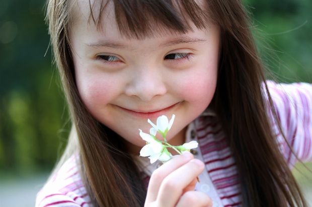 Mädchen mit Down-Syndrom
